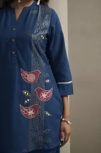 Women's pure cotton bird embroidered straight kurta with solid pure cotton pants co-ord set
