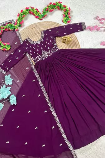 purple color elegant embroidery with sequence detailing faux georgette gown set