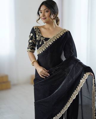 Black tissue satin embrloidered saree with unstitched blouse piece. 1