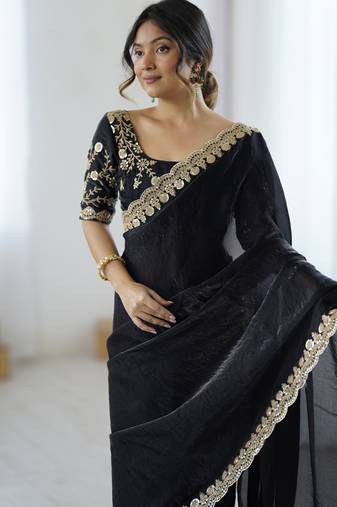 Black tissue satin embrloidered saree with unstitched blouse piece.