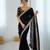 Black tissue satin embrloidered saree with unstitched blouse piece.