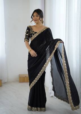 Black tissue satin embrloidered saree with unstitched blouse piece. 3