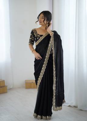 Black tissue satin embrloidered saree with unstitched blouse piece. 4