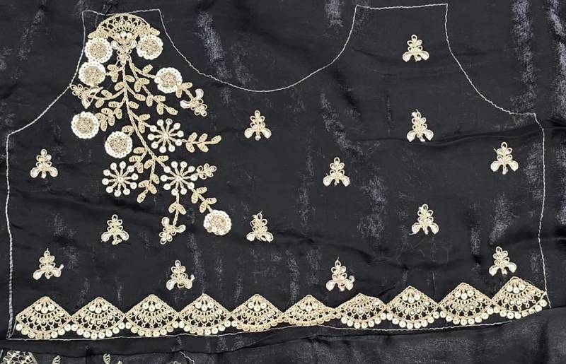 Black tissue satin embrloidered saree with unstitched blouse piece.