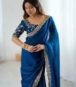 Blue tissue satin embrloidered saree with unstitched blouse piece.