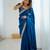Blue tissue satin embrloidered saree with unstitched blouse piece.