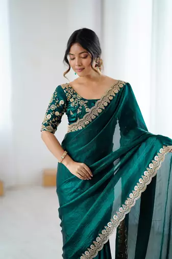 Bottle green tissue satin embrloidered saree with unstitched blouse piece.