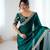 Bottle green tissue satin embrloidered saree with unstitched blouse piece.