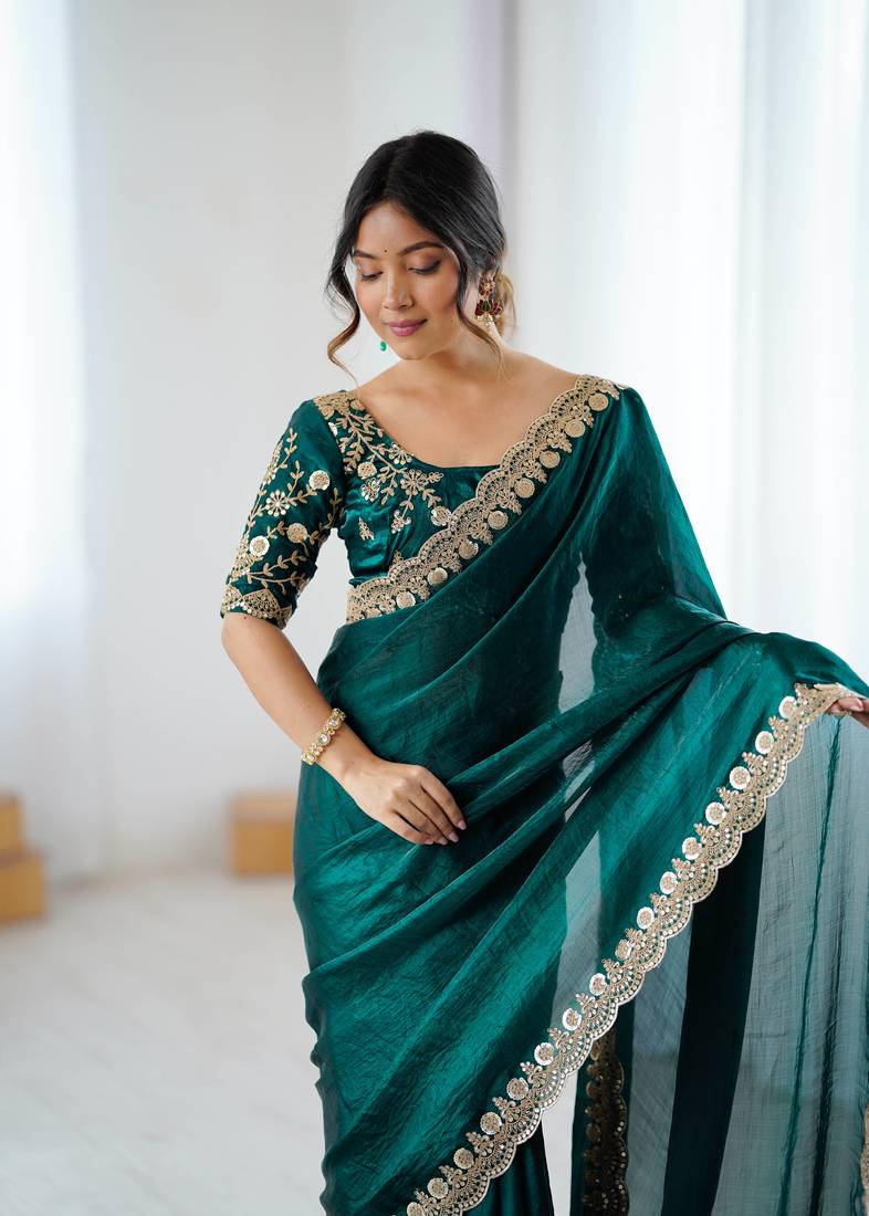 Bottle green tissue satin embrloidered saree with unstitched blouse piece.