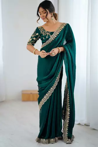 Bottle green tissue satin embrloidered saree with unstitched blouse piece.