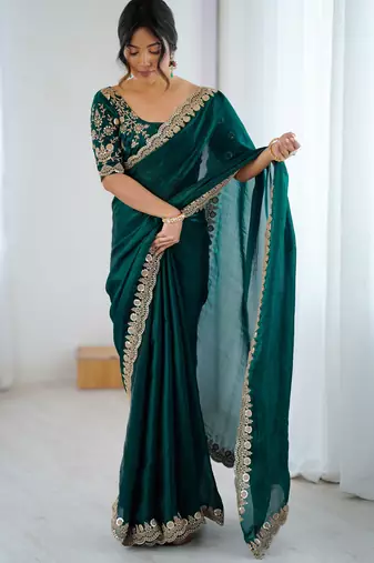 Bottle green tissue satin embrloidered saree with unstitched blouse piece.