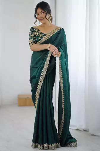 Bottle green tissue satin embrloidered saree with unstitched blouse piece.