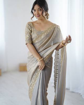 Grey tissue satin embrloidered saree with unstitched blouse piece. 1
