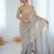 Grey tissue satin embrloidered saree with unstitched blouse piece.