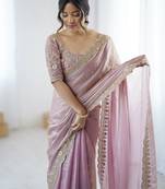 Pink tissue satin embrloidered saree with unstitched blouse piece.