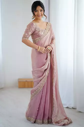 Pink tissue satin embrloidered saree with unstitched blouse piece.