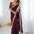 Wine tissue satin embrloidered saree with unstitched blouse piece.