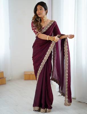 Wine tissue satin embrloidered saree with unstitched blouse piece. 3