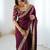 Wine tissue satin embrloidered saree with unstitched blouse piece.