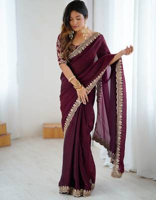 Wine tissue satin embrloidered saree with unstitched blouse piece. 5