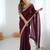 Wine tissue satin embrloidered saree with unstitched blouse piece.