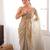 Beige tissue satin sequins saree with unstitched blouse piece.
