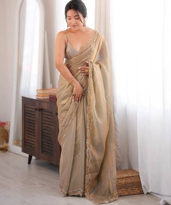 Beige tissue satin sequins saree with unstitched blouse piece. 2