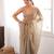 Beige tissue satin sequins saree with unstitched blouse piece.