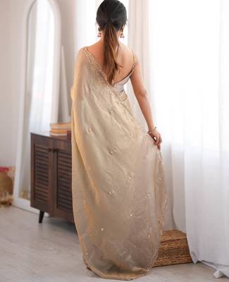 Beige tissue satin sequins saree with unstitched blouse piece. 5