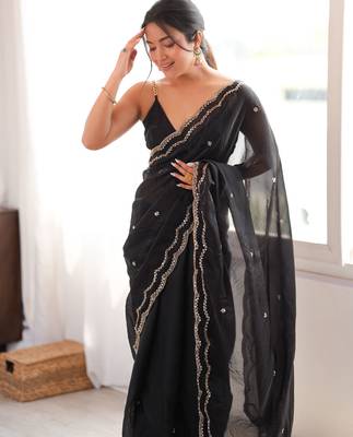 Black tissue satin sequins saree with unstitched blouse piece. 1