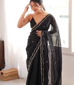 Black tissue satin sequins saree with unstitched blouse piece.
