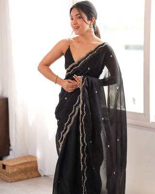 Black tissue satin sequins saree with unstitched blouse piece. 3