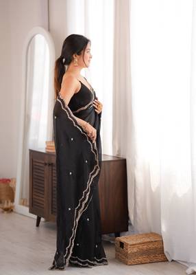 Black tissue satin sequins saree with unstitched blouse piece. 4