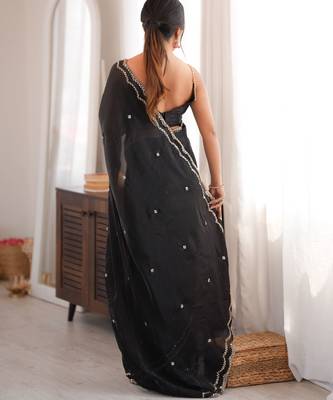 Black tissue satin sequins saree with unstitched blouse piece. 5