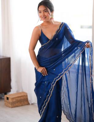 Blue tissue satin sequins saree with unstitched blouse piece. 3