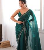 Bottle green tissue satin sequins saree with unstitched blouse piece.