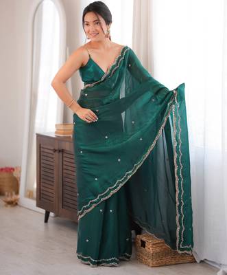 Bottle green tissue satin sequins saree with unstitched blouse piece. 3