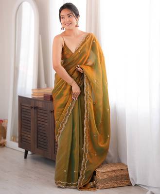 Gold tissue satin sequins saree with unstitched blouse piece. 2