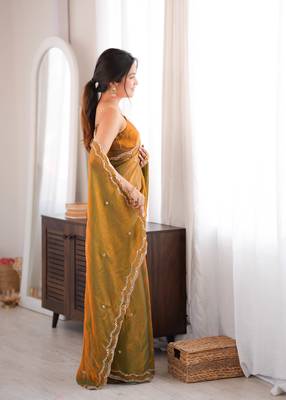Gold tissue satin sequins saree with unstitched blouse piece. 4