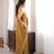 Gold tissue satin sequins saree with unstitched blouse piece.