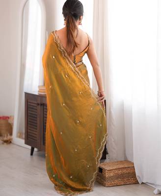 Gold tissue satin sequins saree with unstitched blouse piece. 5