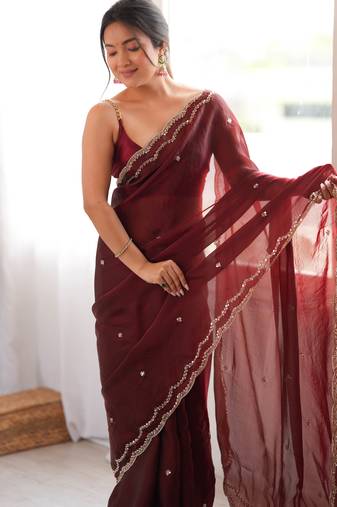 Maroon tissue satin sequins saree with unstitched blouse piece.
