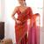 Orange tissue satin sequins saree with unstitched blouse piece.