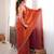 Orange tissue satin sequins saree with unstitched blouse piece.