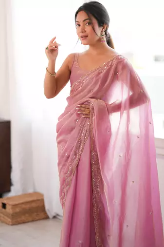 Pink tissue satin sequins saree with unstitched blouse piece.