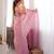 Pink tissue satin sequins saree with unstitched blouse piece.