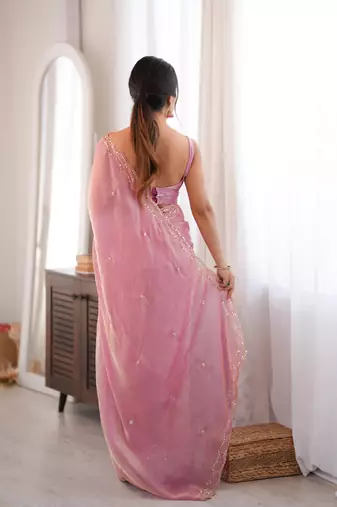 Pink tissue satin sequins saree with unstitched blouse piece.