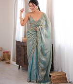 Sky tissue satin sequins saree with unstitched blouse piece.