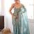 Sky tissue satin sequins saree with unstitched blouse piece.