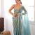 Sky tissue satin sequins saree with unstitched blouse piece.
